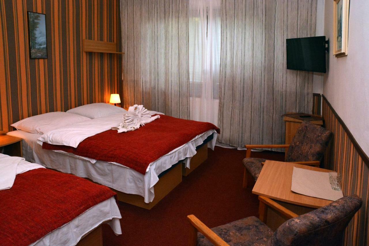 Třílůžkový pokoj